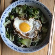 noodle soup with vegetable, sea weeds and fried egg