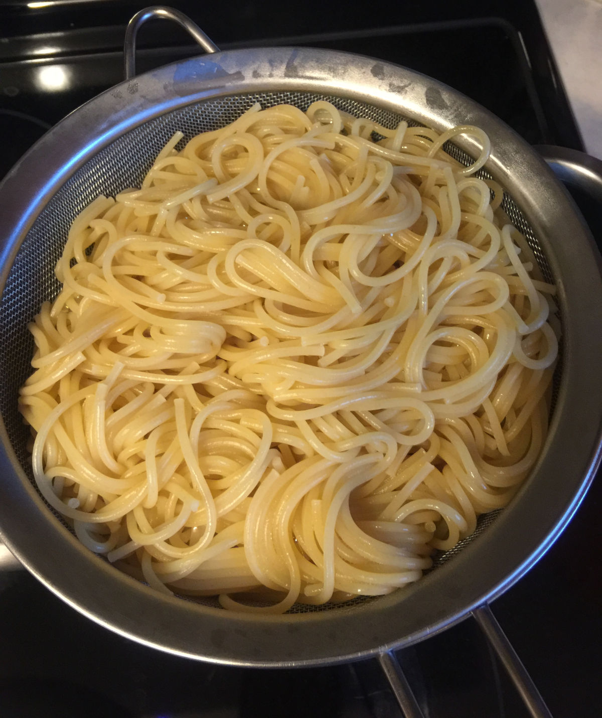 Cook pasta and drain in a strainer
