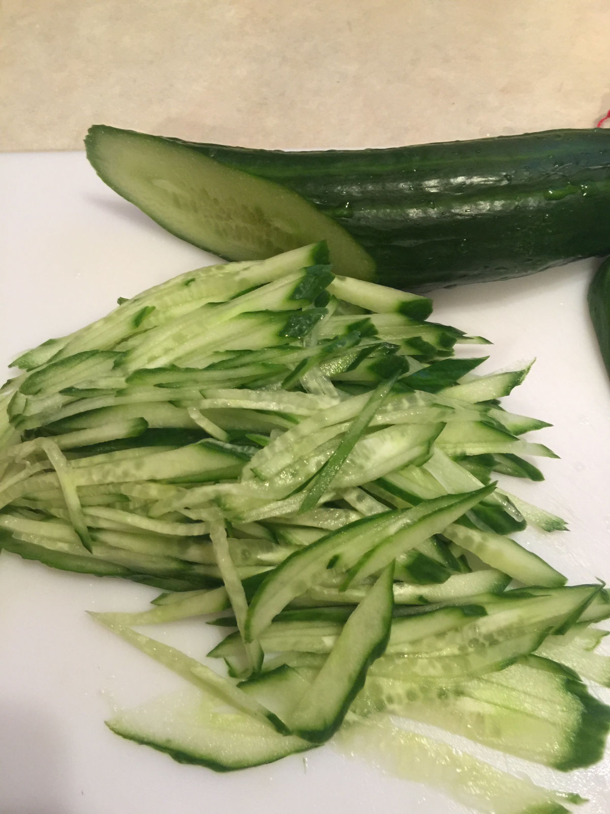 Cut cucumber into matchstick-sized strips