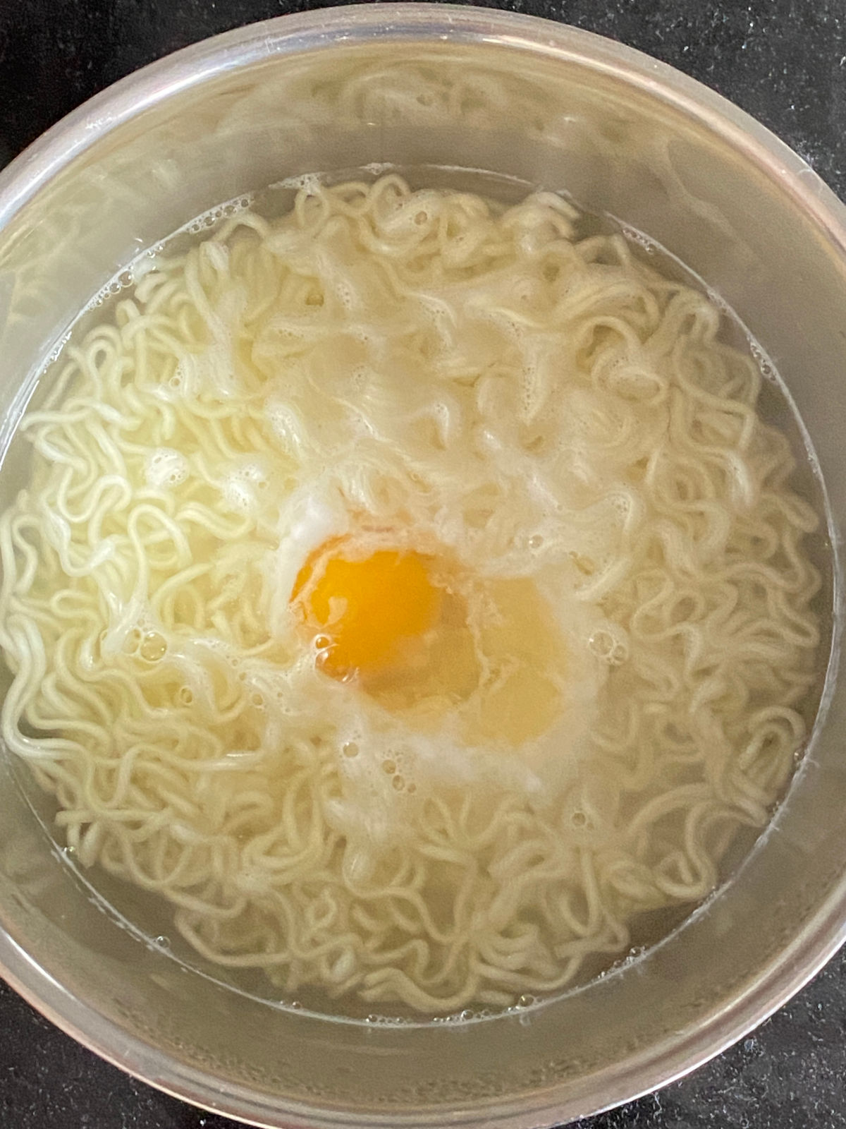 Add egg to the instant noodle soup.